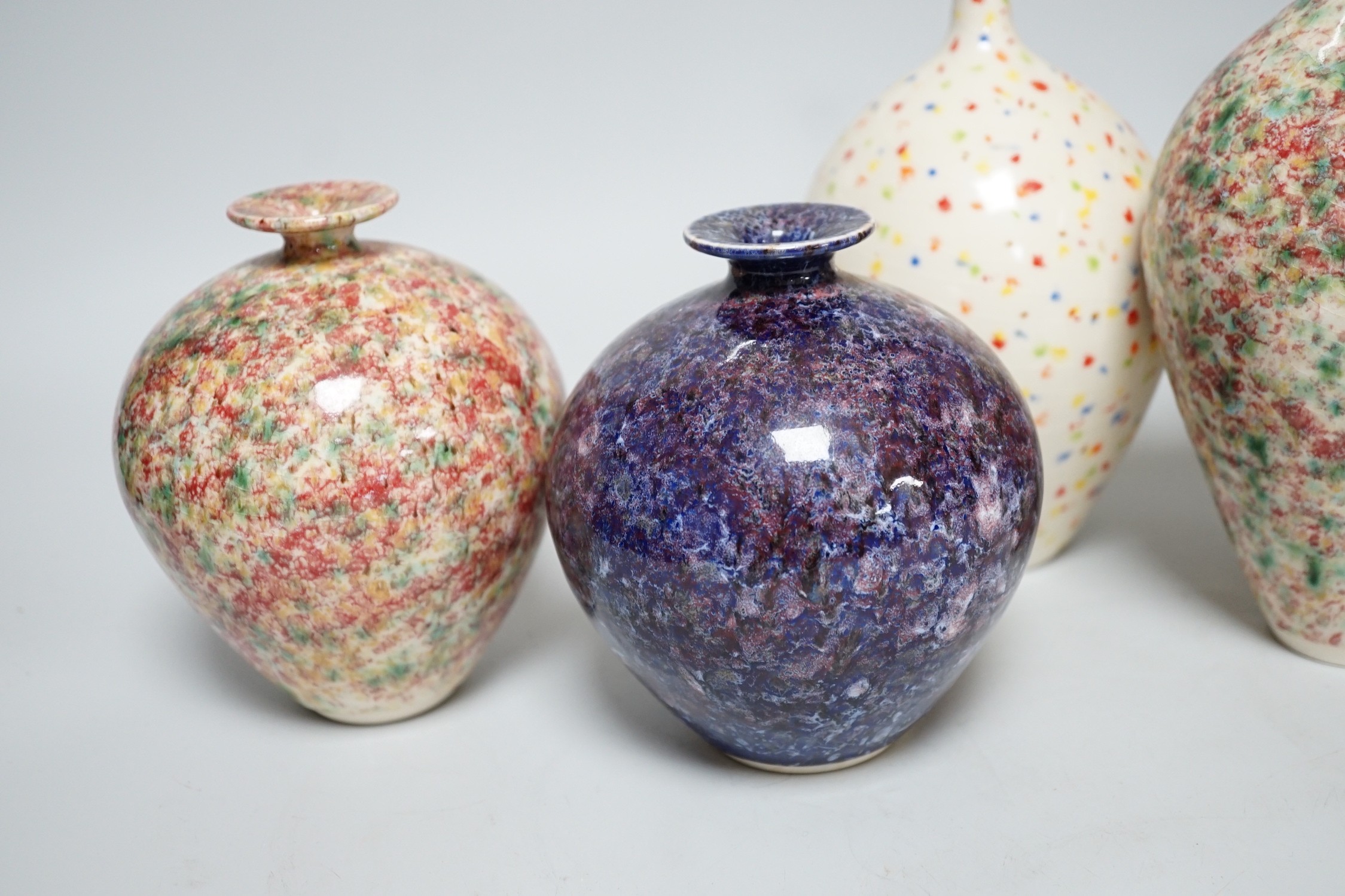 A pair and three other Russel Lakerman pottery vases, tallest 20cm